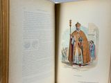an open book with a picture of a man wearing a crown