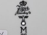 an image of a white plate with a black and white design