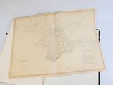 an old map of the state of new york on a table