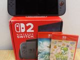 nintendo wii game console with two games and a nintendo wii controller