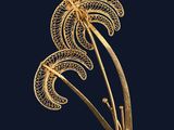 une broche plaquée or au motif stylisé