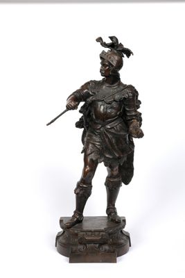 Statue en bronze à patine brune figurant un guerrier casqué
