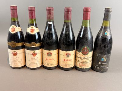 six bottles of wine are lined up in a row on a table