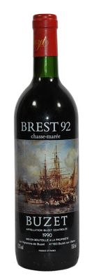 the bottle of wine has a picture of a ship on it