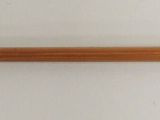 an image of a wooden pole with hooks on it