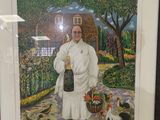 painting of a woman holding a bottle of wine in a garden