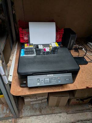 a printer that is sitting on top of a table