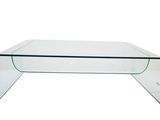 une table basse en verre transparent avec un plateau en verre incurvé