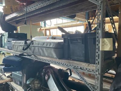 many boxes on the shelves in the warehouse