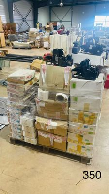 a lot of boxes and boxes on a cart in a warehouse
