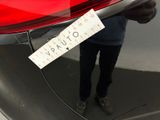 a sticker on the back of a car that says outuarive