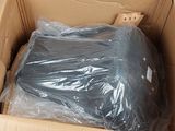 a cardboard box with a plastic bag inside of it