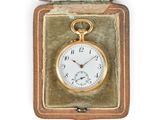 a gold pocket watch in a case on a white background