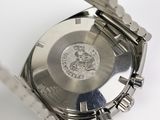 an image of a close up of a wrist watch on a white surface
