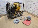 a machine that is sitting on the floor in a room