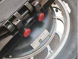 a close up of a tire with a tire clamp attached to it