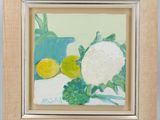 a painting of a white cauliflower and lemons on a table