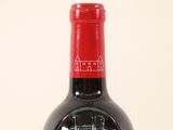 a bottle of wine that is sitting on a table