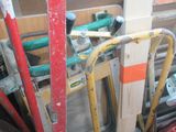 a lot of tools that are sitting on the floor