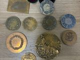 a lot of coins and other items on the table