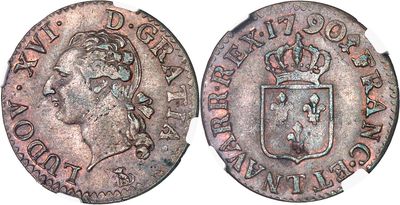 une pièce d'argent surmontée d'une couronne