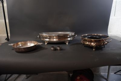 three bowls and a bowl on a table in front of a camera