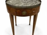 an image of a small table with a marble top
