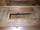 a picture of a wooden floor with a hole in it