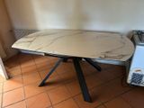 a table with a marble top in a room