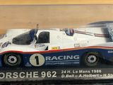 a plastic case with a model of a racing car in it