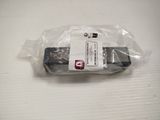 a cell phone wrapped in a plastic bag on a table