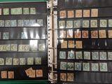 a binder with a lot of stamps on it