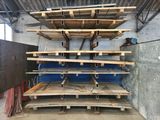 a large stack of wooden pallets in a warehouse