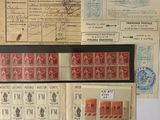 some old stamps and envelopes are on a white surface