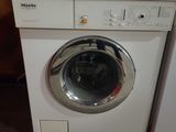 an image of a white washer and dryer sitting next to each other