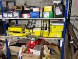 many boxes and boxes on the shelves in the garage