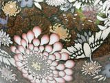 a vase with flowers painted on it sitting on a table