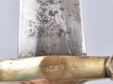 an image of a close up of a knife on a table