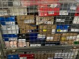 a large metal cart with many boxes on top of it