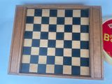 a picture of a wooden board with a black and white checkered pattern