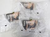 four packages of daily underwear wrapped in plastic bags on a white surface