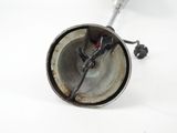 a metal object that is sitting on a white surface