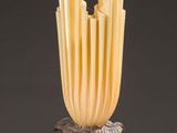 a vase that has been turned into a sculpture on a table