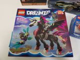 a box of legos with a picture of a dragon riding a horse