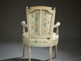 an image of a chair with a floral design on it