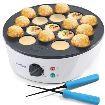 une photo d'un gaufrier contenant tout un tas de beignets