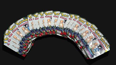 a lot of pokemon cards on a black background