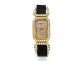 une montre pour femme sertie de diamants et dotée d'un bracelet en cuir noir