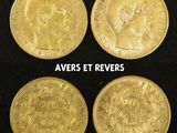 four different types of gold coins on a black surface