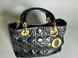 chanel black quilted leather handbag with gold hardware